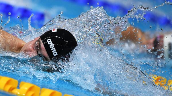Михаил Довгалюк на дистанции 200 м вольным стилем  в финальном заплыве среди мужчин на чемпионате России по плаванию в Казани.
