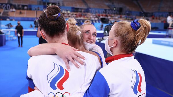 Российские гимнастки после победы в командном турнире