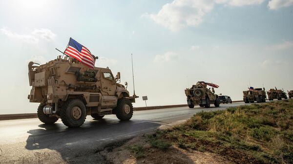 Колонна военных автомобилей США, прибывающая из северного Ирака