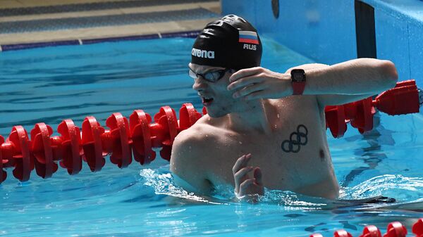 Спортсмен олимпийской российской сборной по плаванию Григорий Тарасевич