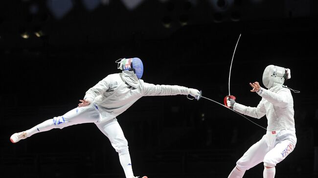 О Сан Ук (слева) в финале Олимпиады