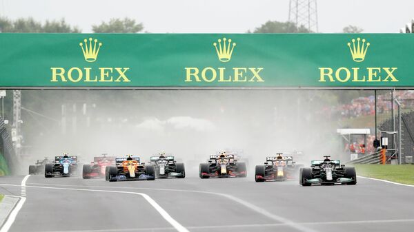 Formula One F1 - Hungarian Grand Prix - Hungaroring, Budapest, Hungary - August 1, 2021 Mercedes' Lewis Hamilton leads at the start of the race REUTERS/David W Cerny