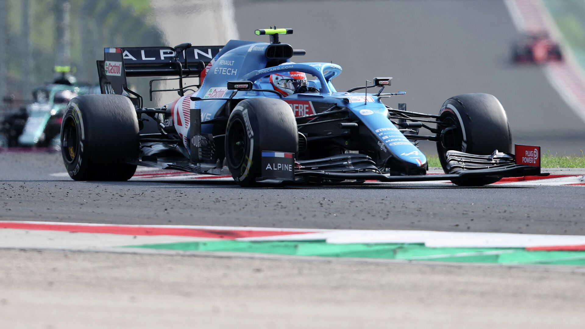 Alpine's French driver Esteban Ocon competes to win the Formula One Hungarian Grand Prix at the Hungaroring race track in Mogyorod near Budapest on August 1, 2021. (Photo by FERENC ISZA / AFP) - РИА Новости, 1920, 01.08.2021