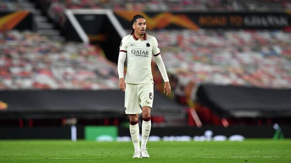 Former United player, Roma's English defender Chris Smalling looks on during the UEFA Europa League semi-final, first leg football match between Manchester United and Roma at Old Trafford stadium in Manchester, north west England, on April 29, 2021. (Photo by Paul ELLIS / AFP)