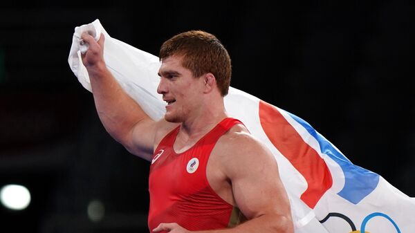 Муса Евлоев, завоевавший золотую медаль на соревнованиях по греко-римской борьбе среди мужчин в весовой категории до 97 кг на XXXII Олимпийских играх в Токио