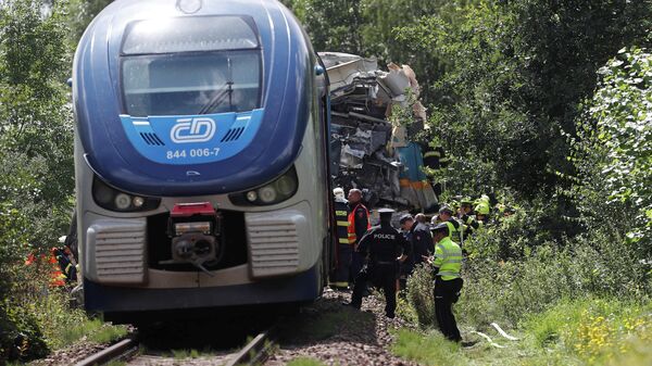На месте столкновения пассажирских поездов в Чехии