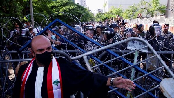 Столкновения участников акции протеста с полицией в Бейруте
