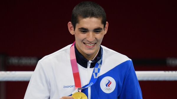 Альберт Батыргазиев, завоевавший золотую медаль в соревнованиях по боксу среди мужчин в весовой категории до 57 кг на XXXII летних Олимпийских играх в Токио