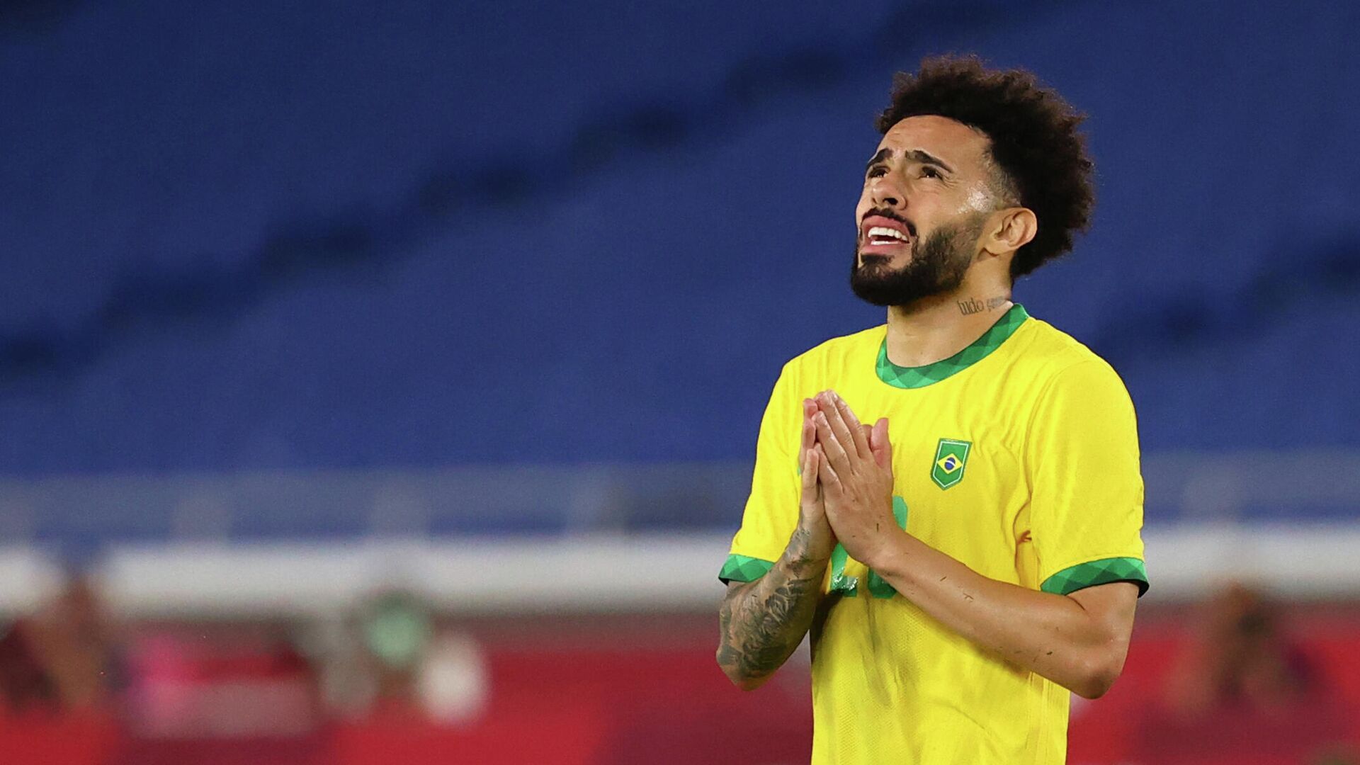 Tokyo 2020 Olympics - Soccer Football - Men - Gold medal match - Brazil v Spain - International Stadium Yokohama, Yokohama, Japan - August 7, 2021.  Claudinho of Brazil reacts after a missed chance. REUTERS/Thomas Peter - РИА Новости, 1920, 07.08.2021