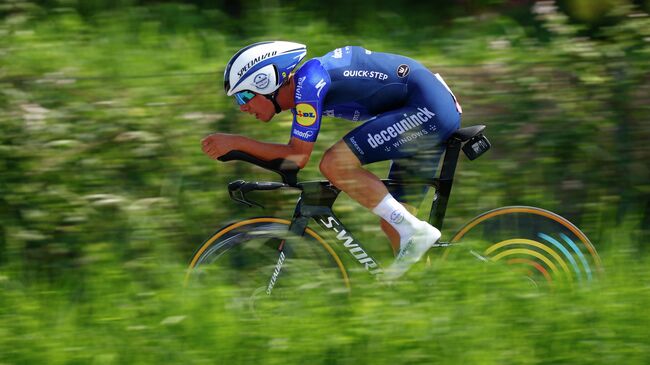 Team Deceuninck rider Portugal's Joao Almeida rides during the 21st and last stage of the Giro d'Italia 2021 cycling race, a 30.3km individual time trial between Senago and Milan on May 30, 2021. (Photo by Luca Bettini / AFP)