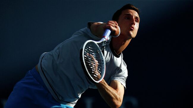 TORONTO, ON - AUGUST 14: Joe Salisbury of Great Britain serves with partner Rajeev Ram of the United States during a semifinal doubles match against Joran Vliegen of Belgium and Sander Gille of Belgium on Day Six of the National Bank Open at Aviva Centre on August 14, 2021 in Toronto, Ontario, Canada.   Vaughn Ridley/Getty Images/AFP (Photo by Vaughn Ridley / GETTY IMAGES NORTH AMERICA / Getty Images via AFP)