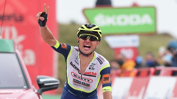Team Intermarche Wanty Gobert Mater's Estonian rider Rein Taaramae celebrtates at the finish line wins the 3rd stage of the 2021 La Vuelta cycling tour of Spain, a 202,8km race from Santo Domingo de Silos to Espinosa de los Monteros, on August 16, 2021. (Photo by ANDER GILLENEA / AFP)