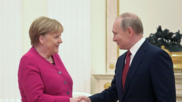 Владимир Путин и Ангела Меркель во время встречи