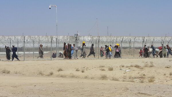 Люди на границе Пакистана и Афганистана в районе пограничного города Чаман