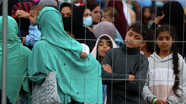 Беженцы из Афганистана, эвакуированные в город Кайзерслаутерн, Германия 