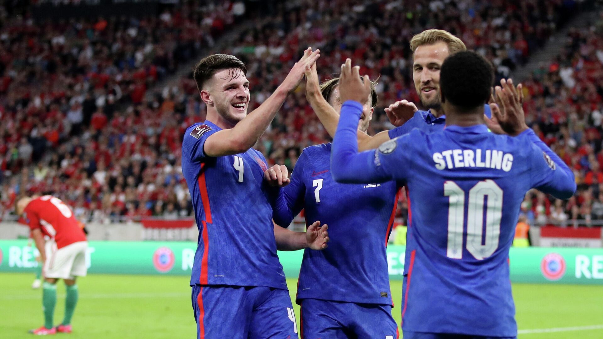 Soccer Football - World Cup - UEFA Qualifiers - Group I - Hungary v England - Puskas Arena, Budapest, Hungary - September 2, 2021 England's Harry Kane celebrates scoring their second goal with Declan Rice, Jack Grealish and Raheem Sterling REUTERS/Carl Recine - РИА Новости, 1920, 02.09.2021