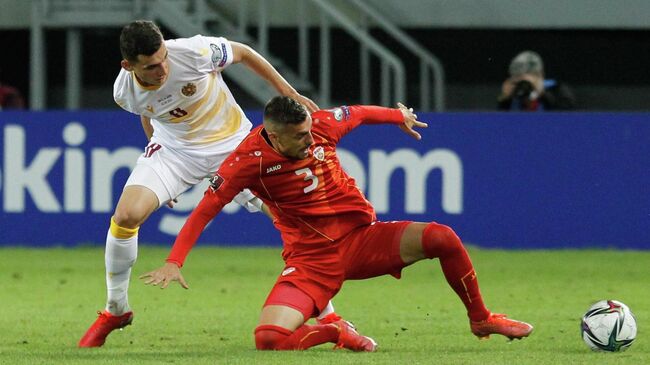 Soccer Football - World Cup - UEFA Qualifiers - Group J - North Macedonia v Armenia - Tose Proeski Arena, Skopje, North Macedonia - September 2, 2021  North Macedonia's Stefan Askovski in action with Armenia's Eduard Spertsyan REUTERS/Ognen Teofilovski