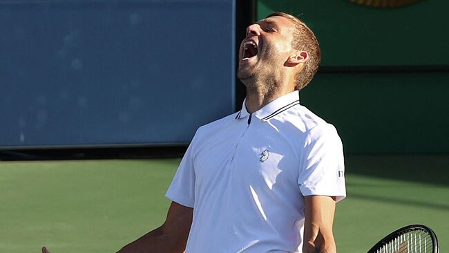 NEW YORK, NEW YORK - SEPTEMBER 03: Daniel Evans of Great Britain reacts against Alexei Popyrin of Australia during his Men's Singles third round match on Day Five at USTA Billie Jean King National Tennis Center on September 03, 2021 in New York City.   Matthew Stockman/Getty Images/AFP (Photo by MATTHEW STOCKMAN / GETTY IMAGES NORTH AMERICA / Getty Images via AFP)