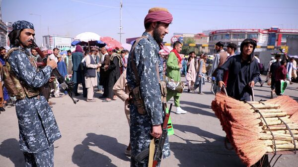 Боевики Талибана* на улице Кабула