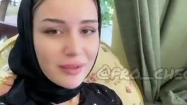 Скриншот видео с участием чеченской девушки Халимат Тарамовой