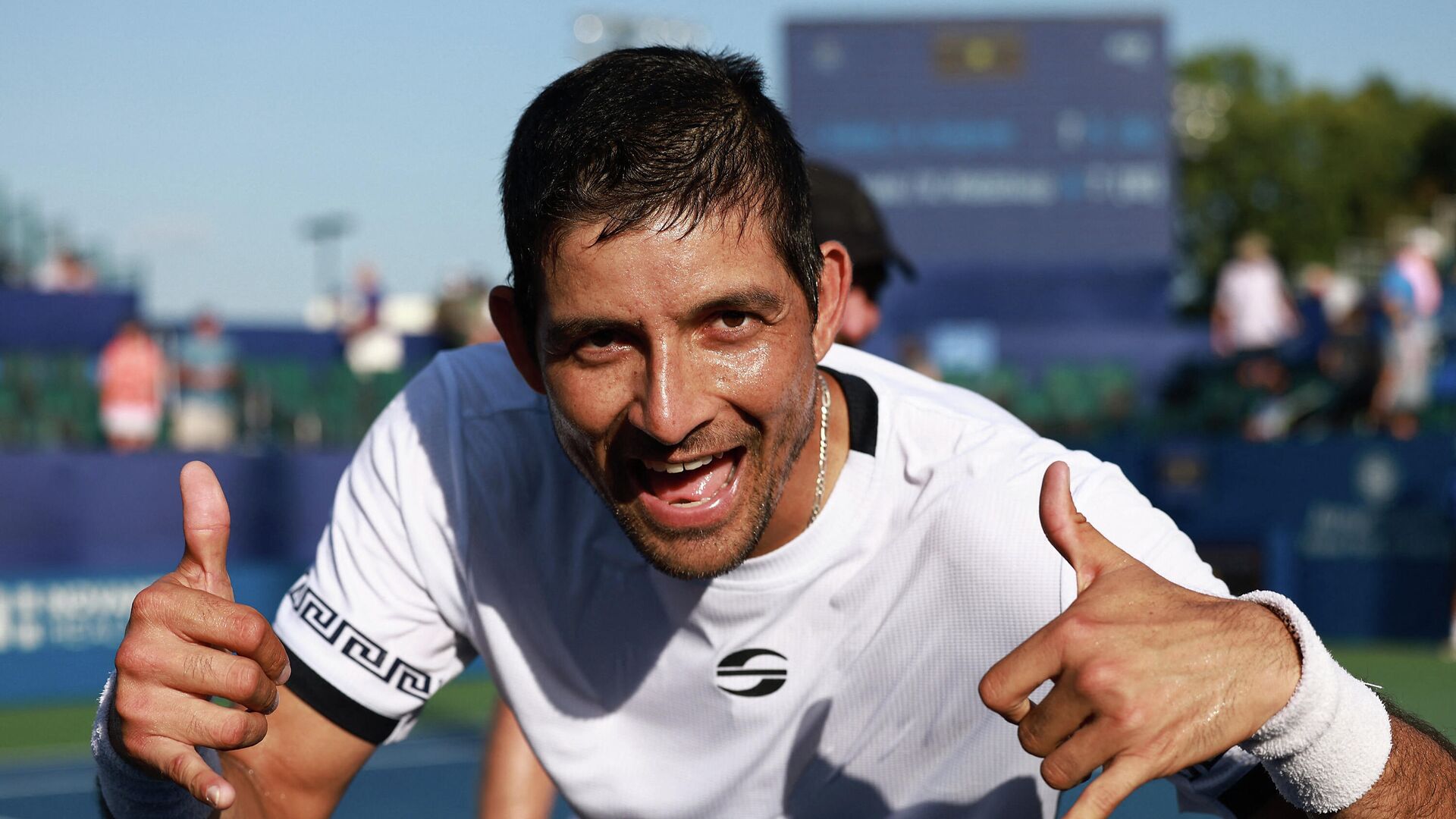 WINSTON SALEM, NORTH CAROLINA - AUGUST 27: Marcelo Arevalo of El Salvador celebrates after partnering with Matwe Middelkoop of Netherlands to defeat Ivan Dodig of Croatia and Austin Krajicek in the doubles final of the Winston-Salem Open at Wake Forest Tennis Complex on August 27, 2021 in Winston Salem, North Carolina.   Grant Halverson/Getty Images/AFP (Photo by GRANT HALVERSON / GETTY IMAGES NORTH AMERICA / Getty Images via AFP) - РИА Новости, 1920, 08.09.2021