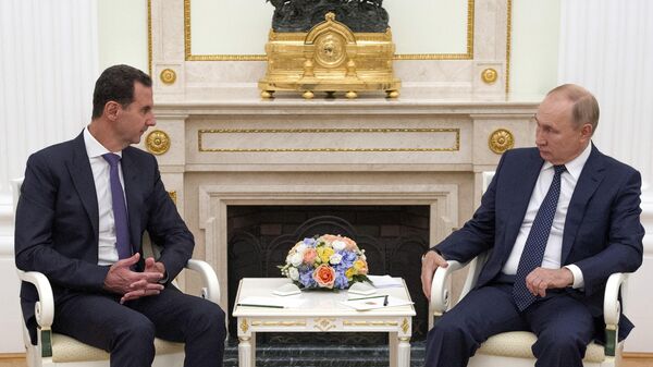 Президент РФ Владимир Путин и президент Сирии Башар Асад во время встречи