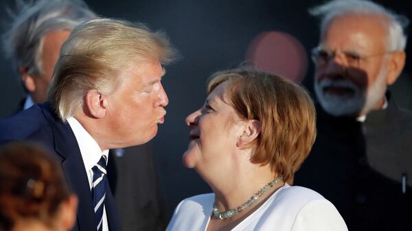 Канцлер Германии Ангела Меркель и Дональд Трамп на саммите G7