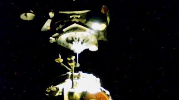 Момент стыковки модуля МКС Наука и корабля Союз