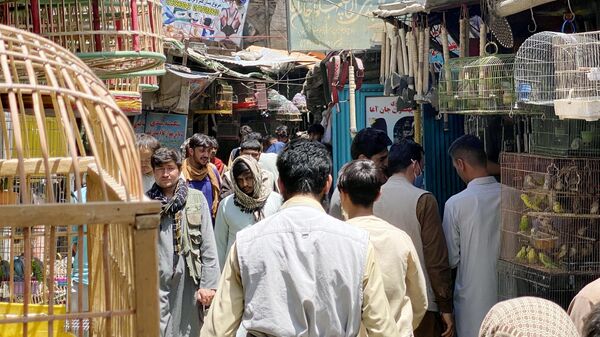 Люди на рынке в Кабуле