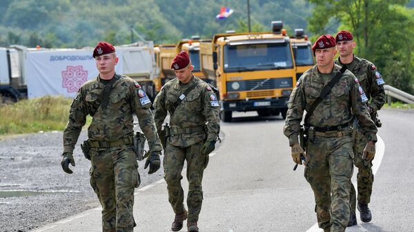 Польские военнослужащие международного контингента KFOR на границе Сербии и Косово