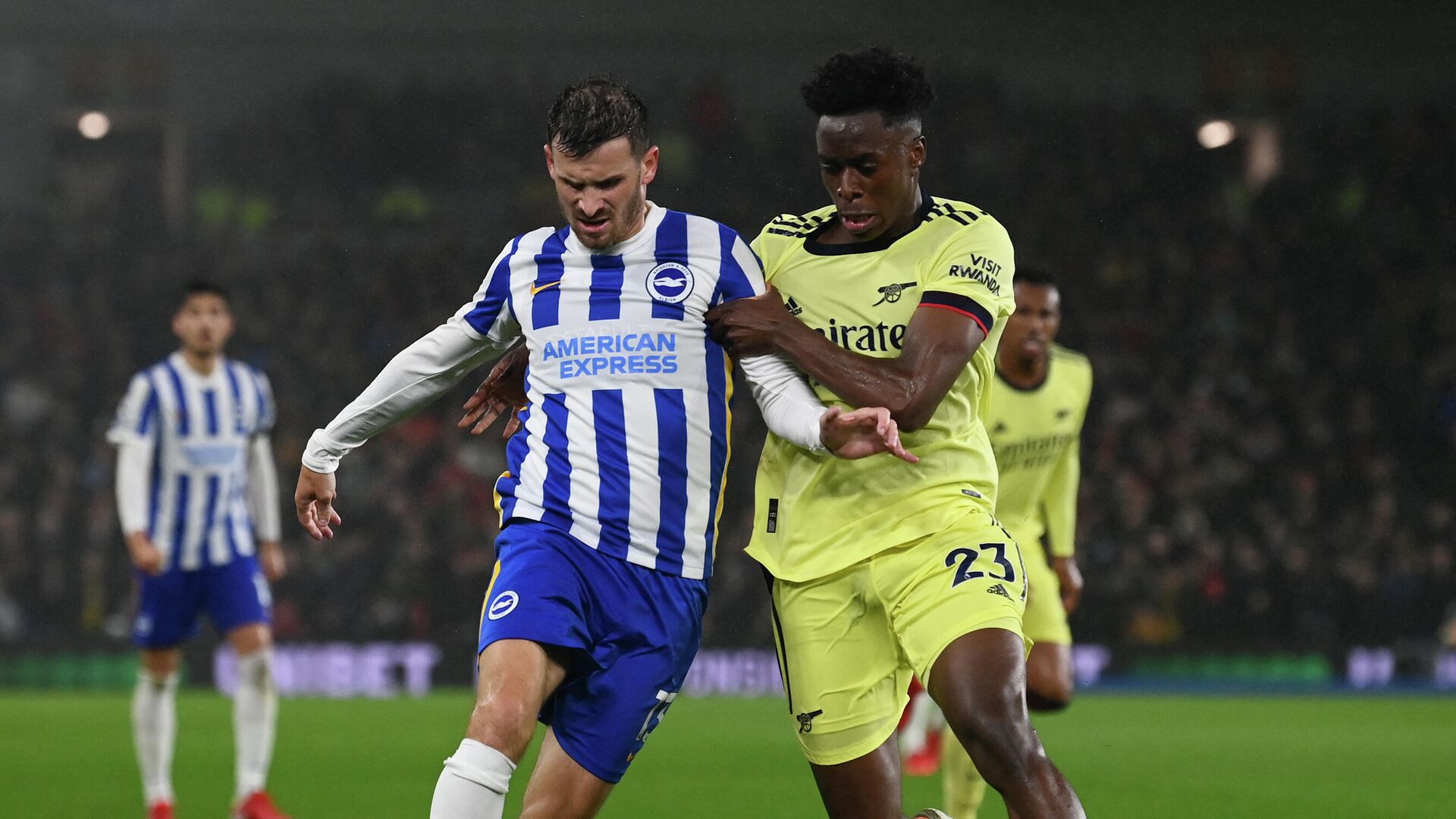 Brighton's German midfielder Pascal Gross (L) and Arsenal's Belgian midfielder Albert Sambi Lokonga compete for the ball during the English Premier League football match between Brighton and Hove Albion and Arsenal at the American Express Community Stadium in Brighton, southern England on October 2, 2021. (Photo by Glyn KIRK / AFP) / RESTRICTED TO EDITORIAL USE. No use with unauthorized audio, video, data, fixture lists, club/league logos or 'live' services. Online in-match use limited to 120 images. An additional 40 images may be used in extra time. No video emulation. Social media in-match use limited to 120 images. An additional 40 images may be used in extra time. No use in betting publications, games or single club/league/player publications. /  - РИА Новости, 1920, 02.10.2021