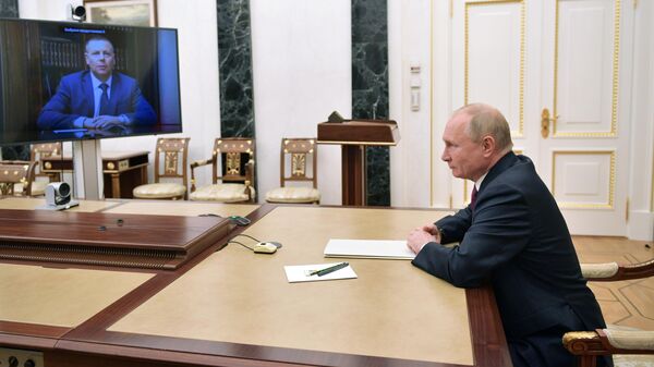 Президент РФ Владимир Путин на встрече в режиме видеоконференции с Михаилом Евраевым