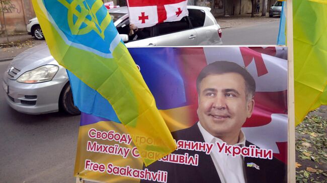 Участники акции в поддержку Михаила Саакашвили проехали на автомобилях с украинскими и грузинскими флагами по улицам Одессы