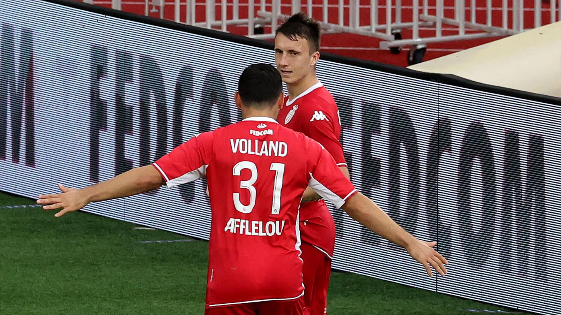 Monaco's Russian midfielder Aleksandr Golovin (R) celebrates with a team mate after scoring a goal during the French L1 football match between Monaco and Bordeaux at the Louis II stadium in Monaco on october 3, 2021. (Photo by Valery HACHE / AFP) - РИА Новости, 1920, 04.11.2021
