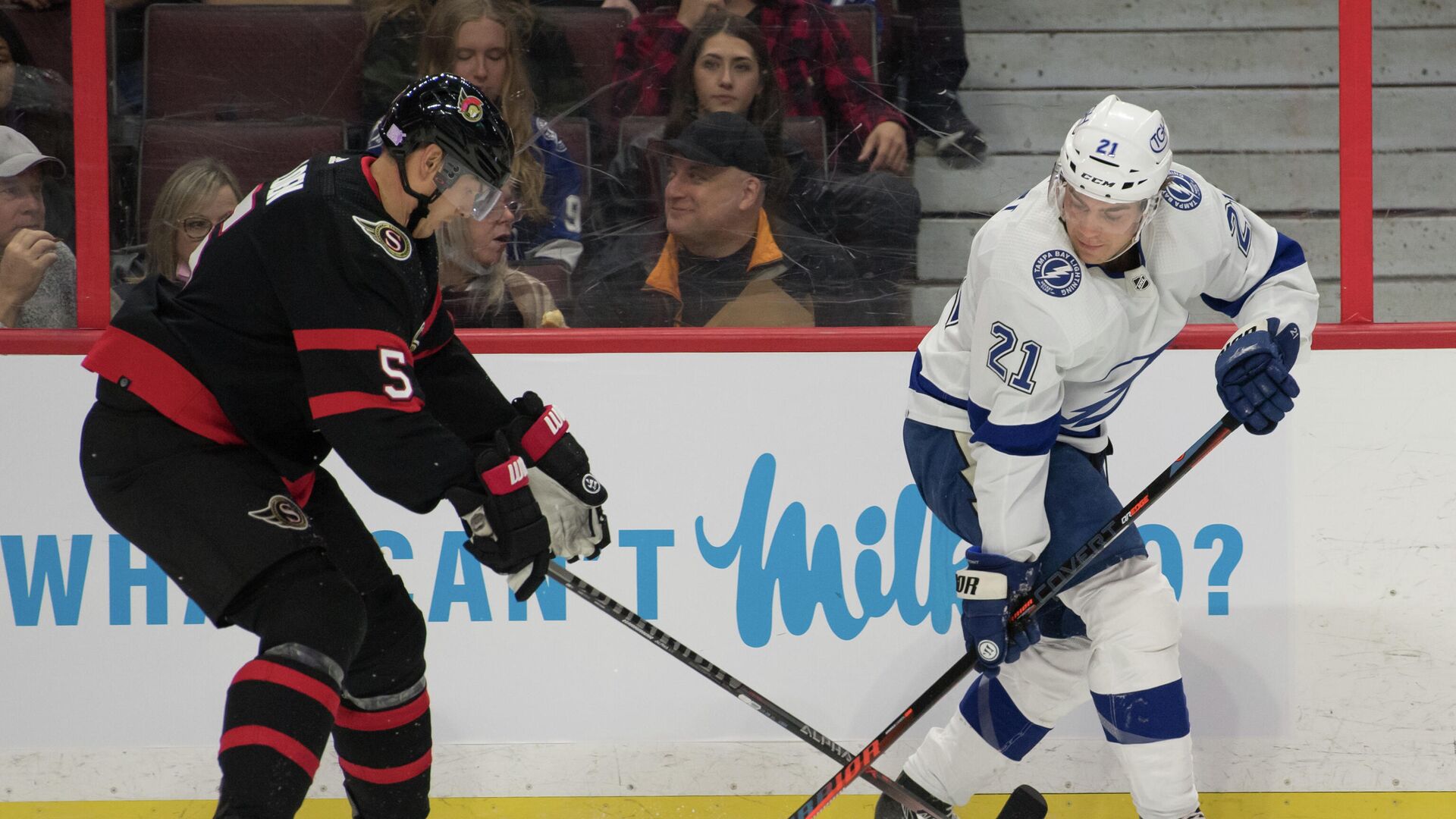 Nov 6, 2021; Ottawa, Ontario, CAN; Ottawa Senators defenseman Nick Holden (5) and Tampa Bay Lightning defenseman Zach Bogosian (21) battle in the first period at the Canadian Tire Centre. Mandatory Credit: Marc DesRosiers-USA TODAY Sports - РИА Новости, 1920, 07.11.2021