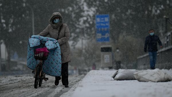 Метель и снегопад в Пекине