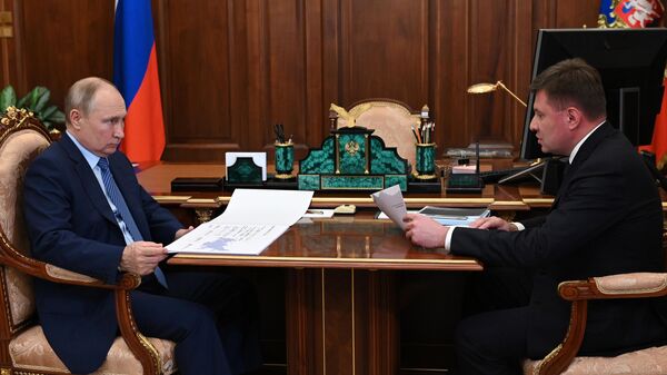 Президент РФ Владимир Путин и генеральный директор холдинга Вертолеты России Андрей Богинский во время встреч