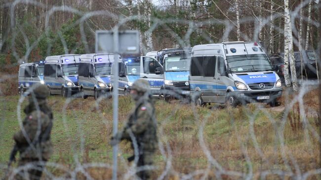 Сотрудники полиции Польши на белорусско-польской границе