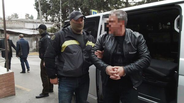 Задержание мужчины за шпионскую деятельность в интересах Украины в Ялте. Кадр видео