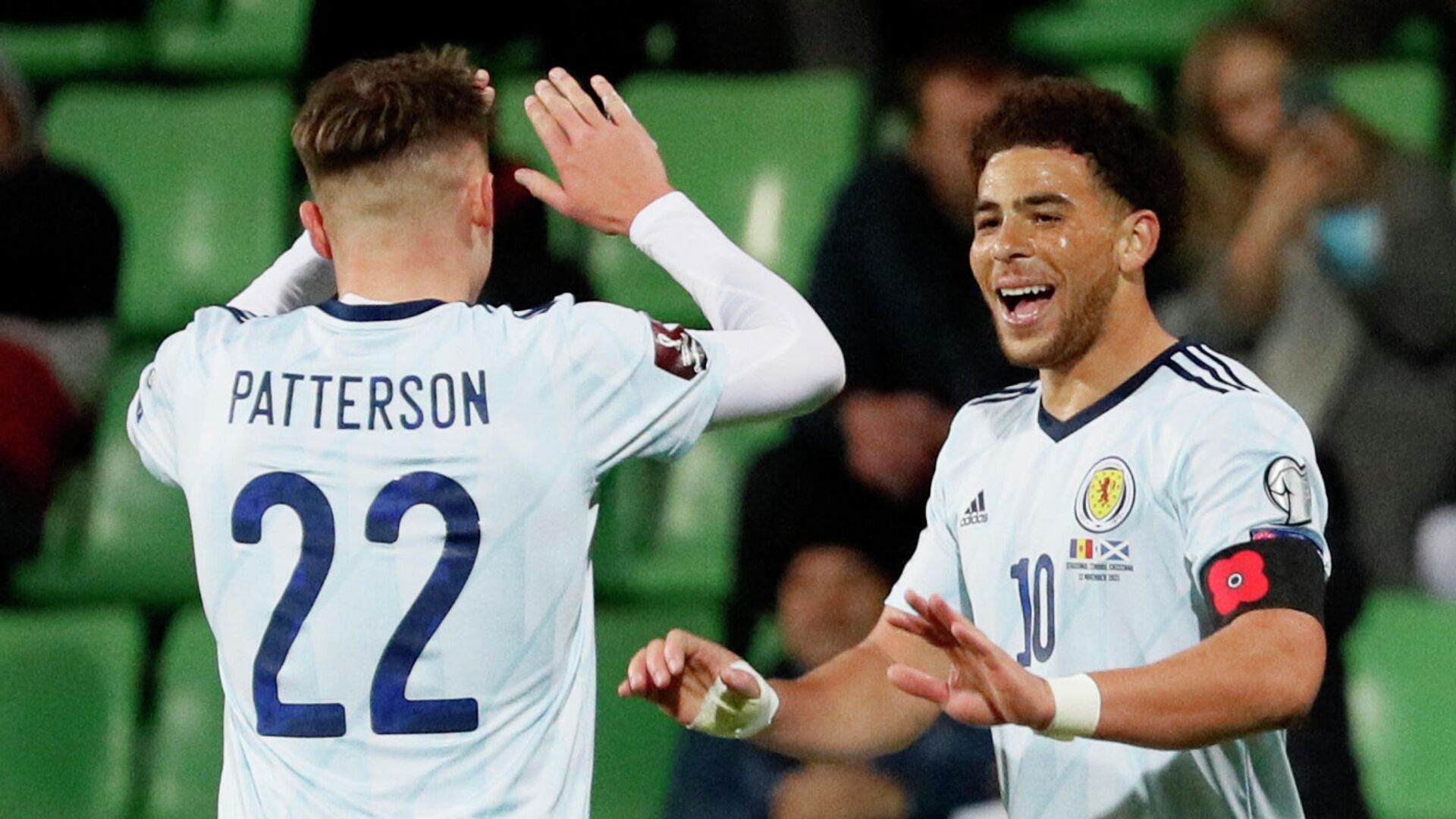 Soccer Football - World Cup - UEFA Qualifiers - Group F - Moldova v Scotland - Zimbru Stadium, Chisinau, Moldova - November 12, 2021 Scotland's Che Adams celebrates scoring their second goal with Nathan Patterson REUTERS/Gleb Garanich - РИА Новости, 1920, 12.11.2021