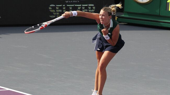 Estonia's Anett Kontaveit jumps as she returns the ball to Czech Republic's Barbora Krejcikova during a 2021 WTA finals tournament singles match in Zapopan, Mexico, on November 10, 2021. - The WTA Tennis Tournament finals, which were originally to be held in China, bagan Wednesday in Zapopan due to the Covid-19 pandemic. (Photo by Ulises Ruiz / AFP)