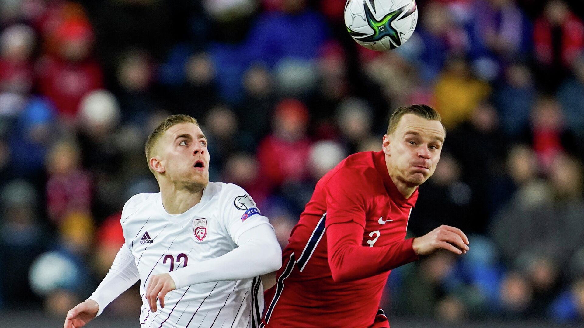 Soccer Football - World Cup - UEFA Qualifiers - Group G - Norway v Latvia - Ullevaal Stadion, Oslo, Norway - November 13, 2021 Latvia's Vladislavs Gutkovskis in action with Norway's Marius Lode  Stian Lysberg Solum/NTB via REUTERS    ATTENTION EDITORS - THIS IMAGE WAS PROVIDED BY A THIRD PARTY. NORWAY OUT. NO COMMERCIAL OR EDITORIAL SALES IN NORWAY. - РИА Новости, 1920, 13.11.2021