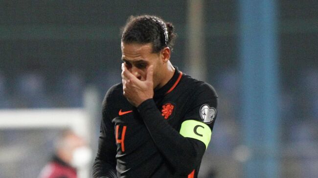 Soccer Football - World Cup - UEFA Qualifiers - Group G - Montenegro v Netherlands - Podgorica City Stadium, Podgorica, Montenegro - November 13, 2021  Netherlands' Virgil van Dijk looks dejected after the match REUTERS/Stevo Vasiljevic