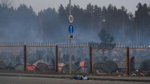 Лагерь нелегальных мигрантов у пункта пропуска Брузги на белорусско-польской границе