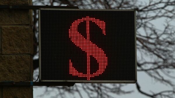 Официальный курс доллара на выходные и понедельник упал ниже 59 рублей