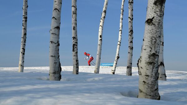 Кэйсин Ёсида (Япония) на дистанции гонки на 15 км свободным стилем среди мужчин в соревнованиях по лыжным гонкам на XXIII зимних Олимпийских играх
