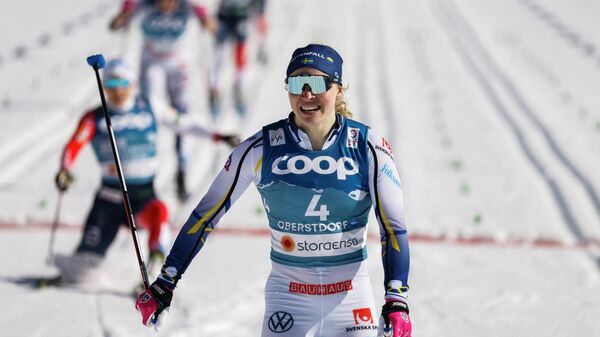 Sweden's Jonna Sundling reacts as she wins the final of the women's classic sprint event at the FIS Nordic Ski World Championships in Oberstdorf, southern Germany, on February 25, 2021. (Photo by Odd ANDERSEN / AFP)