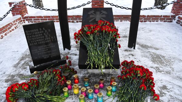 Flowers at the memorial to the workers of the Militarized Mine Rescue Unit (MRSU) on the Miner's Glory alley in the Kemerovo Region