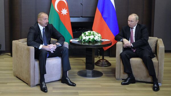  Президент РФ Владимир Путин и президент Азербайджана Ильхам Алиев во время встречи в Сочи