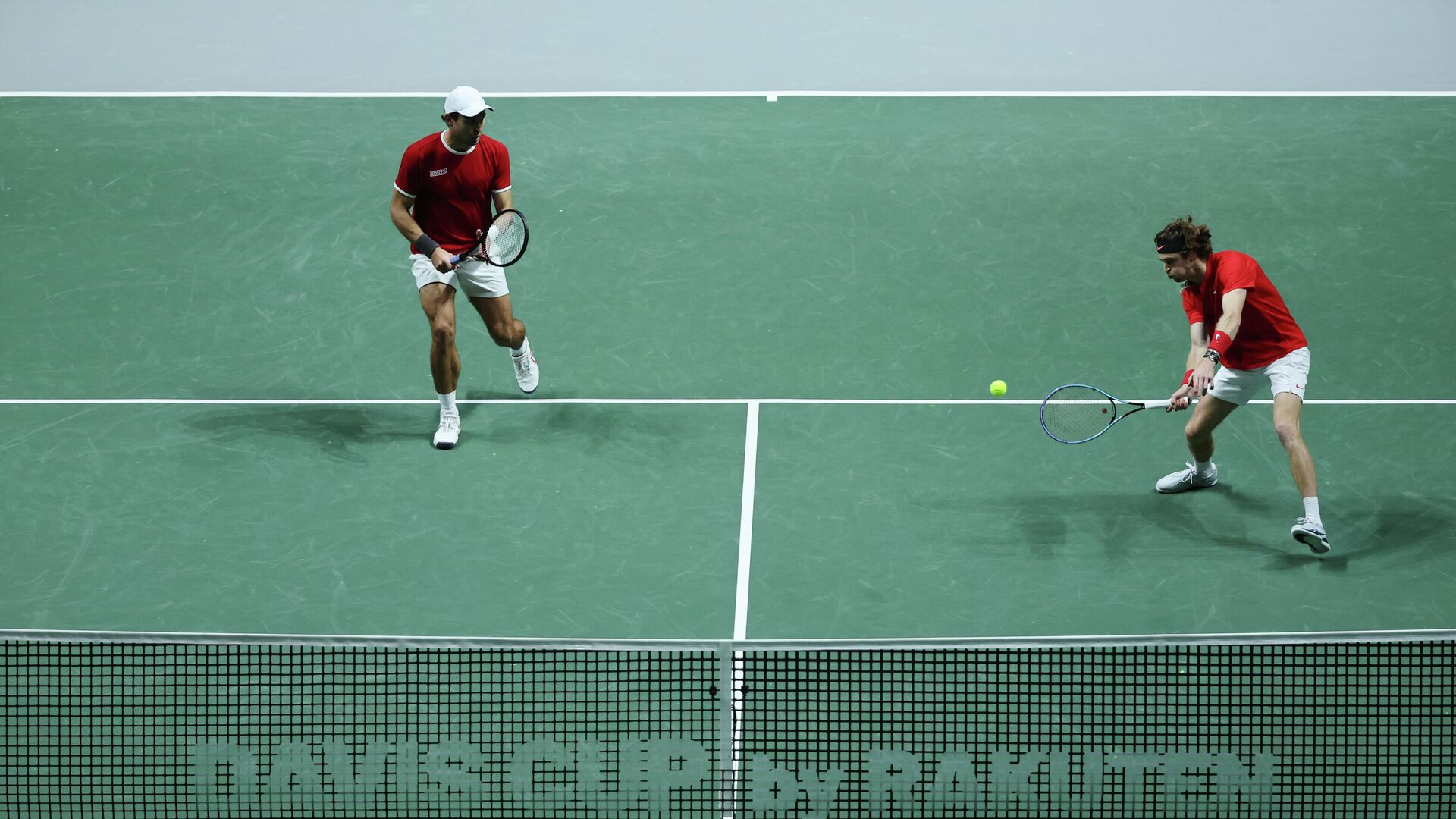 Tennis - Davis Cup Finals - Group A - Russian Tennis Federation v Ecuador - Madrid Arena, Madrid, Spain - November 27, 2021  Russian Tennis Federation's Aslan Karatsev and Andrey Rublev in action during their match against Ecuador's Gonzalo Escobar and Diego Hidalgo REUTERS/Sergio Perez - РИА Новости, 1920, 28.11.2021